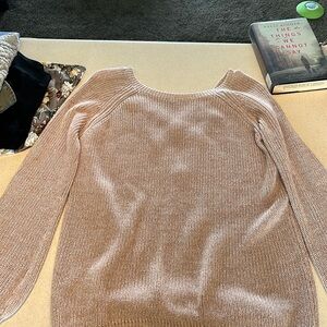 Peach sweater dress, crisscross design and back.